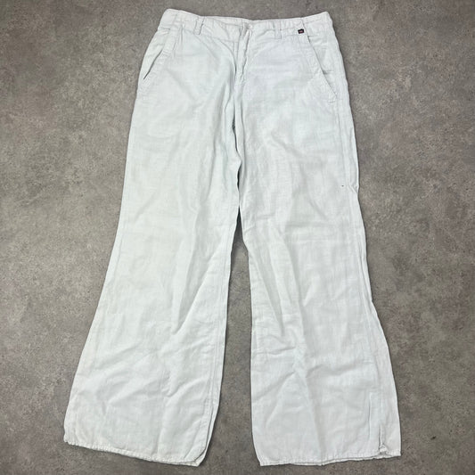 Baggy white linen utility trousers