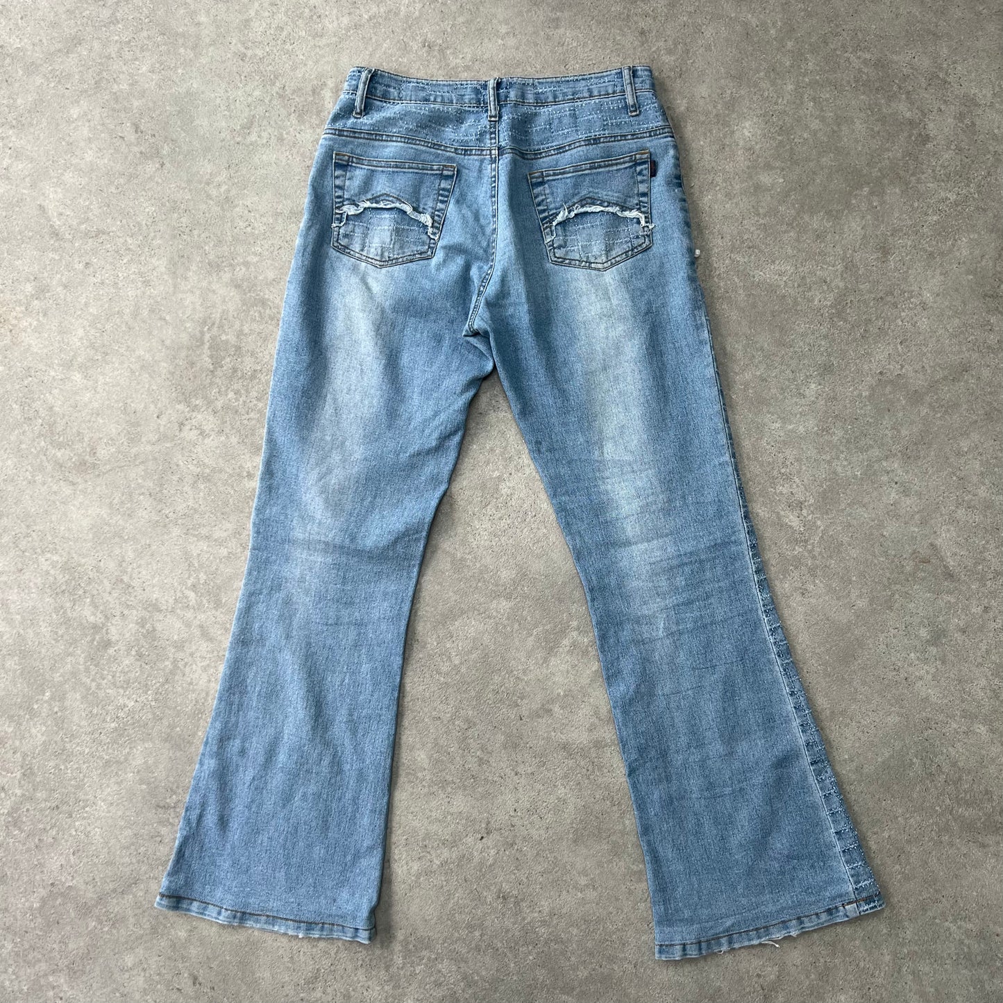 Frayed denim straight leg flared jeans