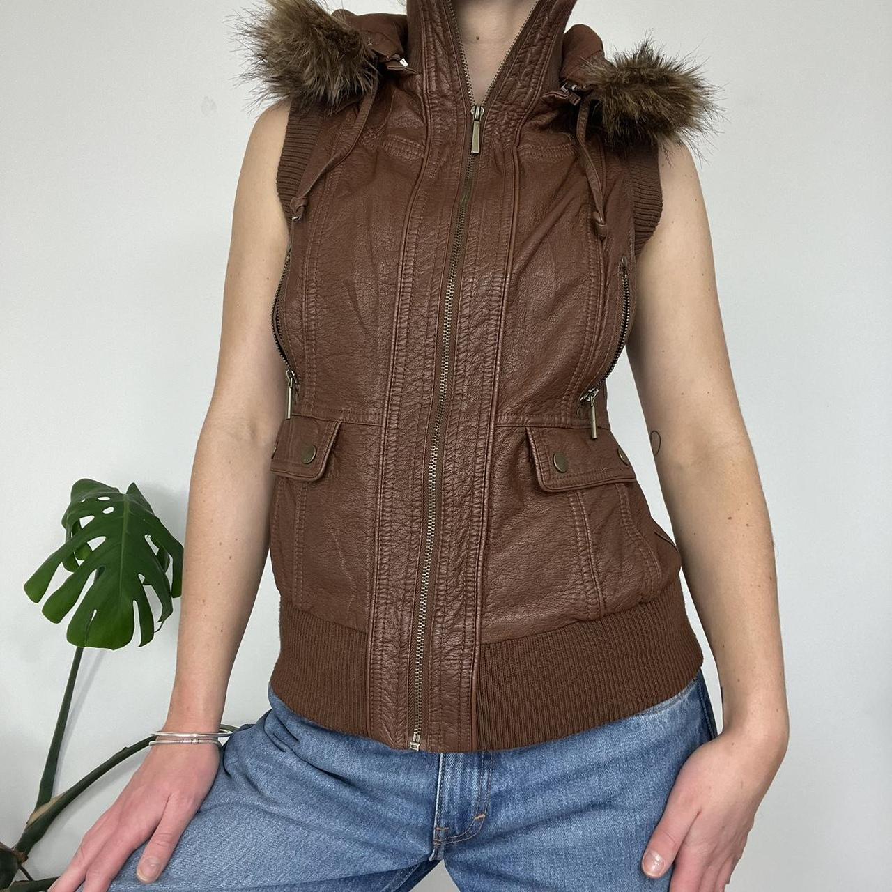 Leather gilet with fur trim hood