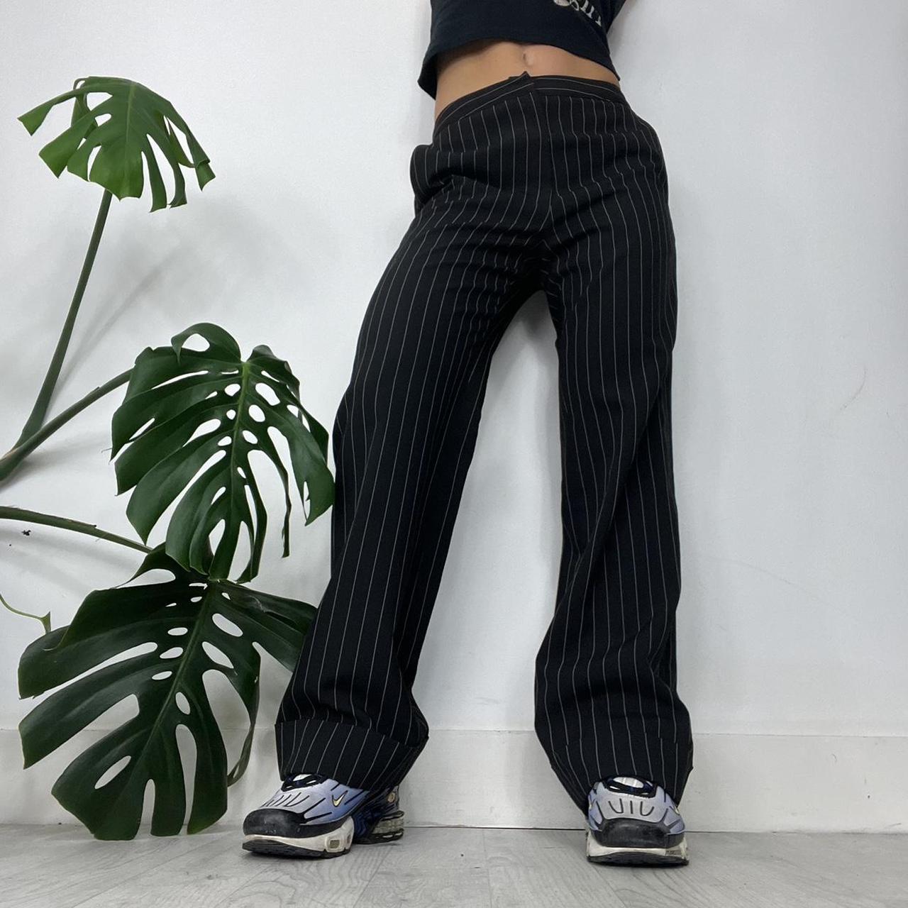 Black baggy pinstripe trousers