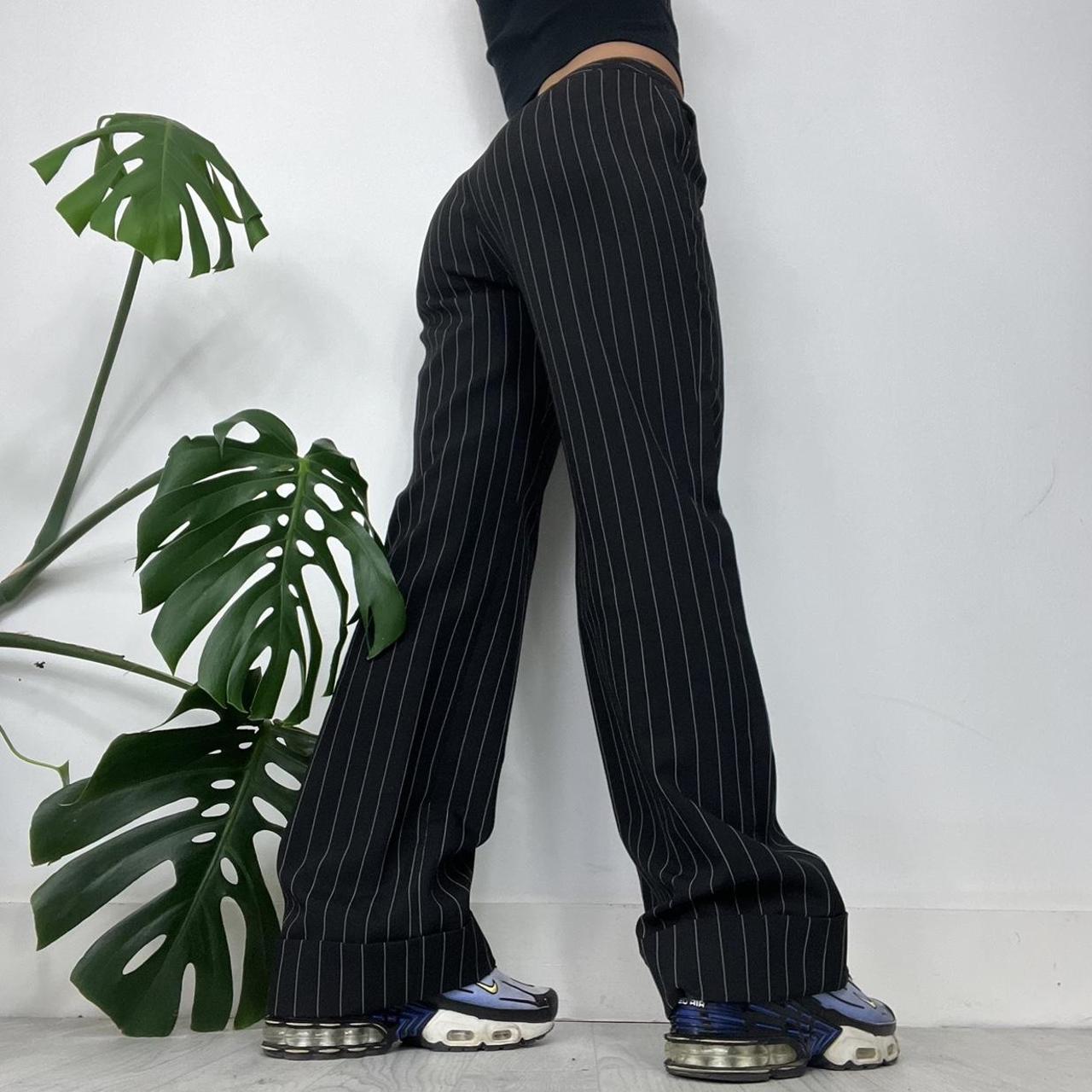 Black baggy pinstripe trousers