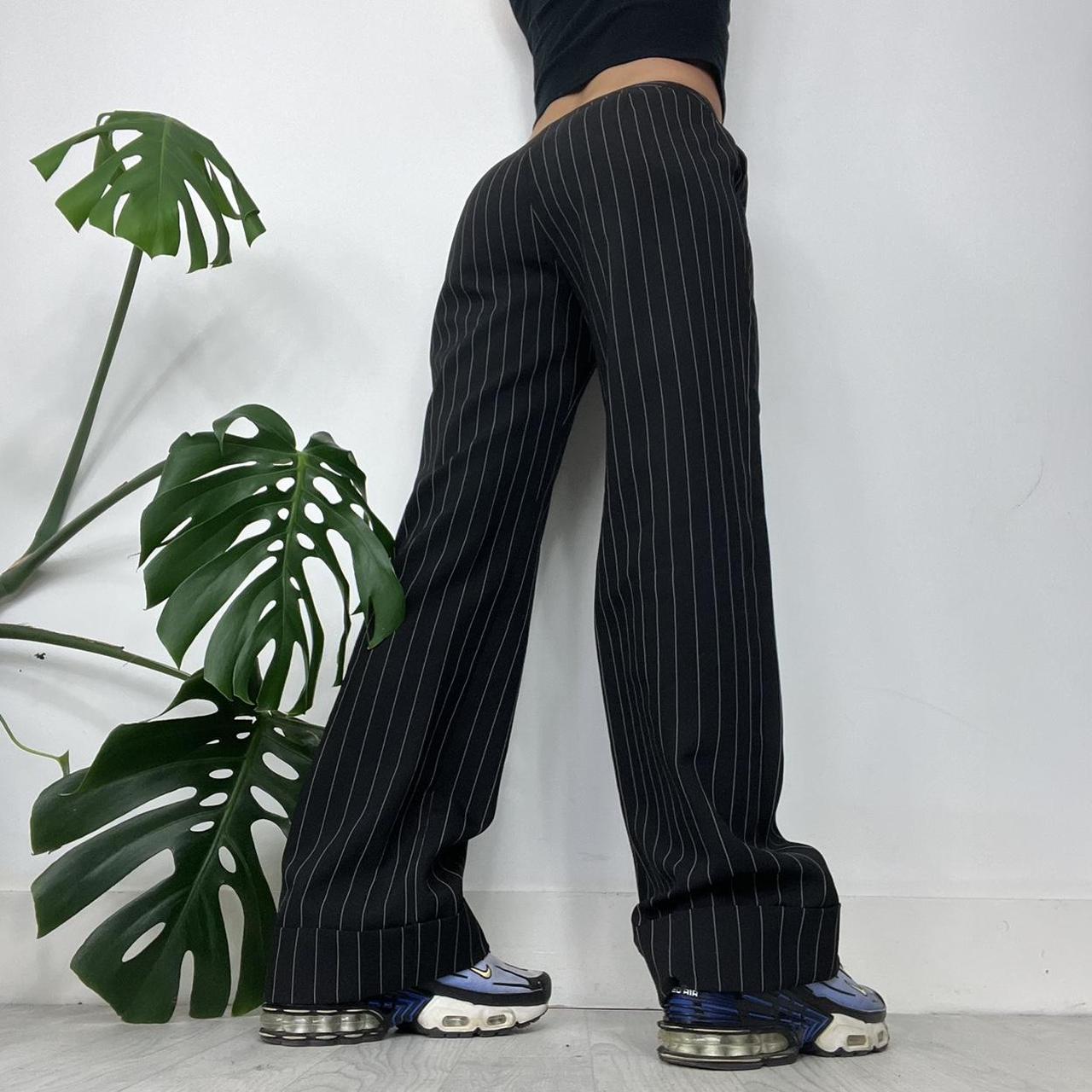 Black baggy pinstripe trousers