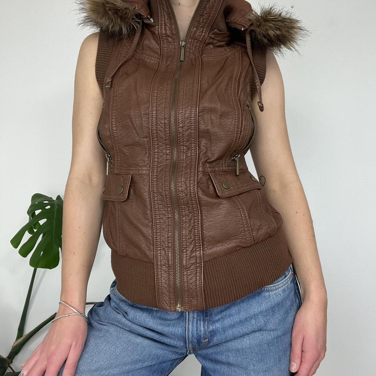 Leather gilet with fur trim hood